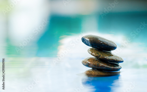 Canvas Print Spa still life with water lily and zen stone in a serenity pool