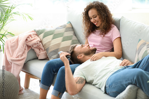 Happy young couple relaxing...