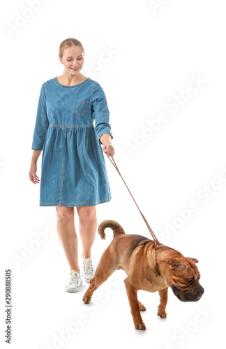 Walking woman with cute dog...