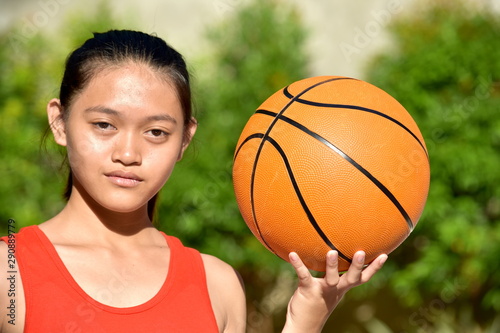 A Serious Fitness Person With Basketball photo