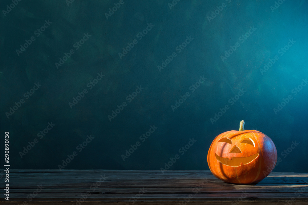 Halloween pumpkin on dark background - obrazy, fototapety, plakaty 