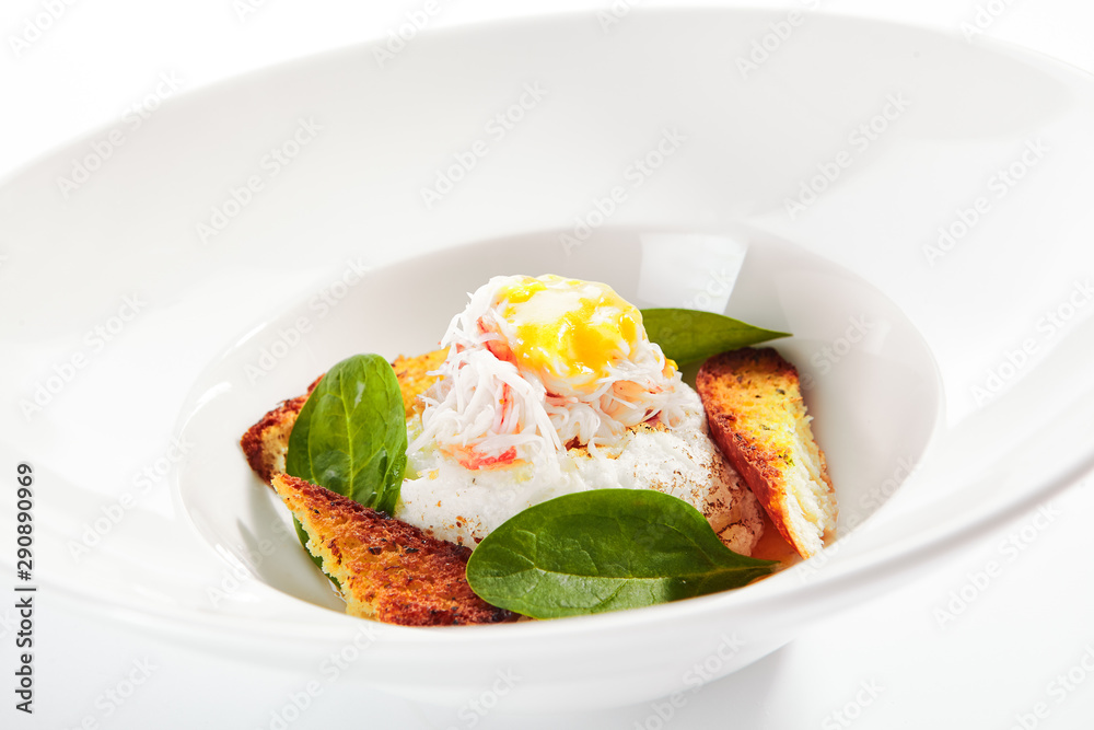 Crab Cake Napoleon with Pike Caviar Sauce Isolated Crab Cake Napoleon with Pike Caviar Sauce Isolated