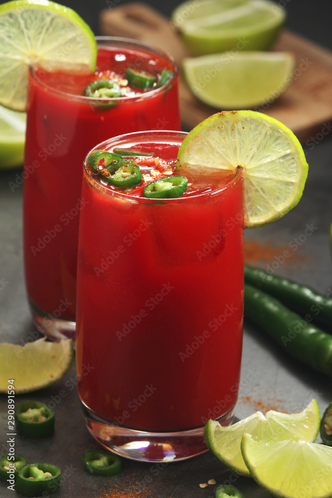 Jalapeno tomato margarita cocktail with lime Jalapeno tomato margarita cocktail with lime
