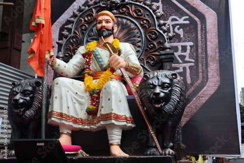 Idol of Chatrapathi Shivaji Maharaj who was a great hindu and maratha warrior. Shiv jayanti parade by shiv sena and MNS. photo