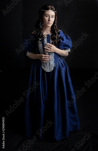 Renaissance woman in blue silk dress