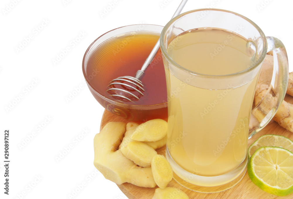 Fototapeta premium Ginger tea cup, lime and honey on cutting board