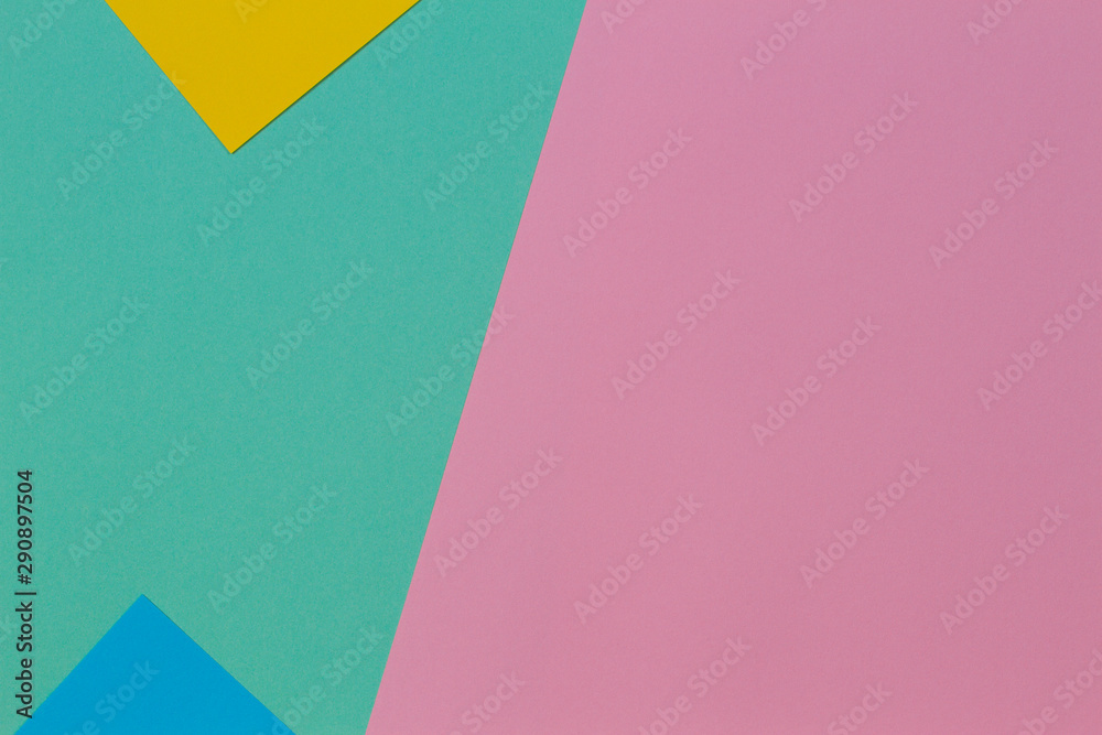 Abstract geometric paper texture background with trendy colors pastel pink, yellow, light blue and green color