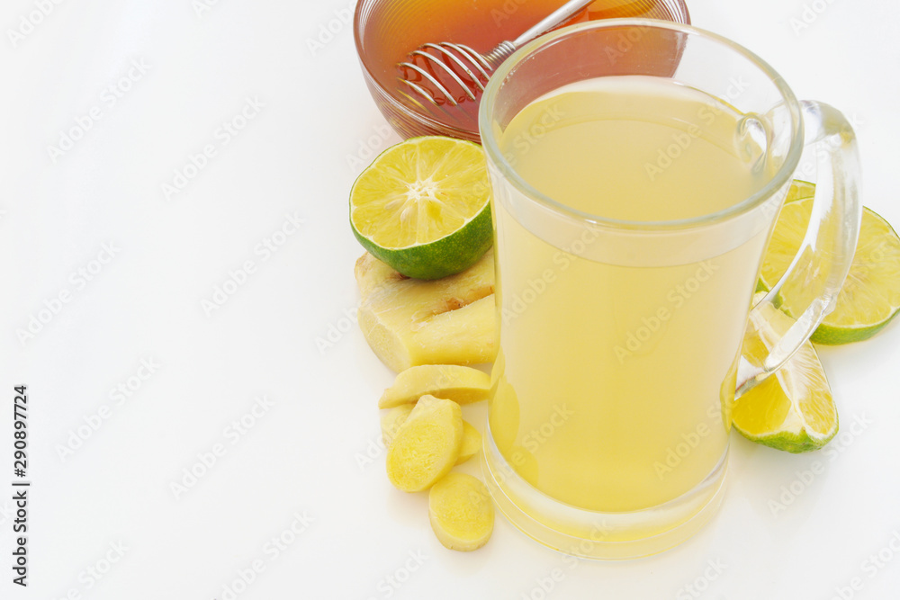Fototapeta premium Ginger tea cup, lime and honey on table with space for text