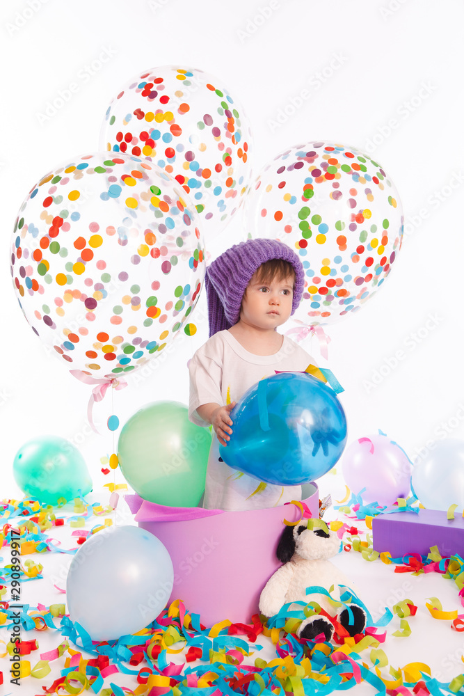 Obraz premium Little Boy Around Birthday Decorations
