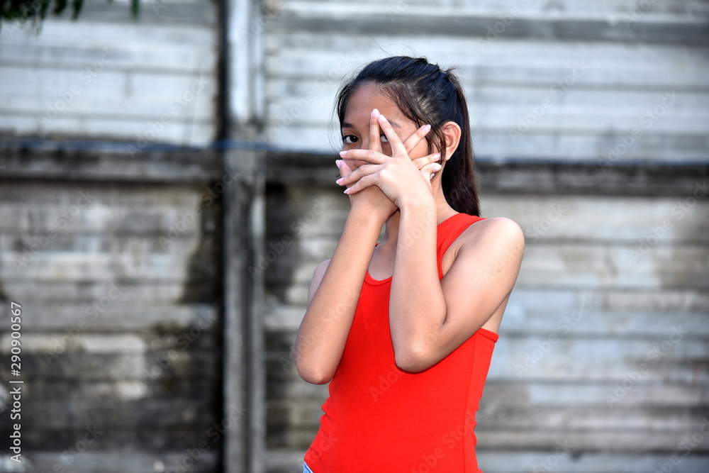 Fototapeta premium A Filipina Teenager Girl And Fear