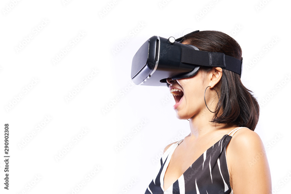 Woman wearing and enjoy Vr-headset on white background Woman wearing and enjoy Vr-headset on white background