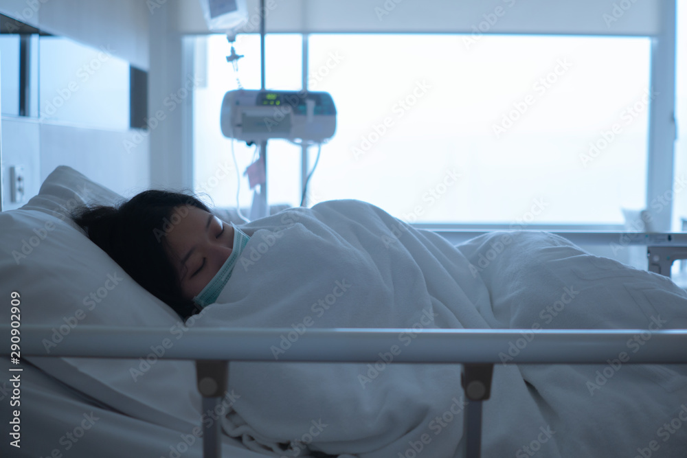 Asian female patient sleeping on hospital bed to recovering sickness,  healthcare and medical concept - image Stock Photo | Adobe Stock