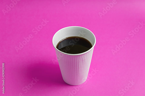 Coffee in a paper cup. 紙製のコップに入ったコーヒー