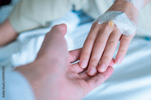 Hand of senior doctor reassuring patient hand  healthcare medical concept - image