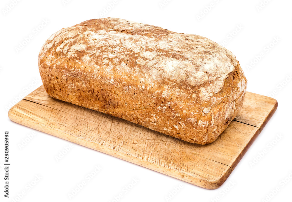 Loaf of bread on plank isolated on white background Loaf of bread on plank isolated on white background