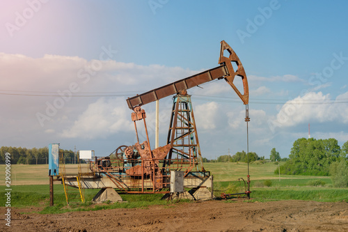 Oil pumpjack, industrial equipment. Rocking machines for power generation. Extraction of oil. Oil well industry.