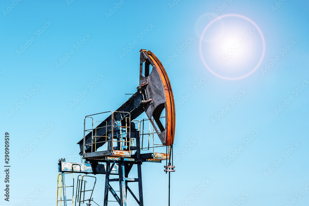 Oil pumpjack, industrial equipment. Rocking machines for power generation. Extraction of oil. Oil well industry.