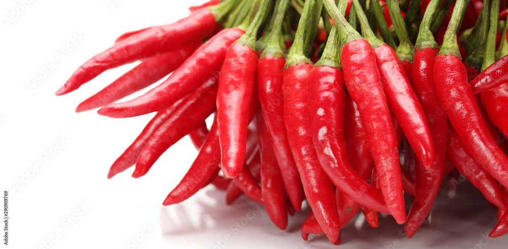 Red chili pepper isolated on a white background. Red chili pepper isolated on a white background.
