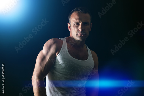 handsome muscle man blue light