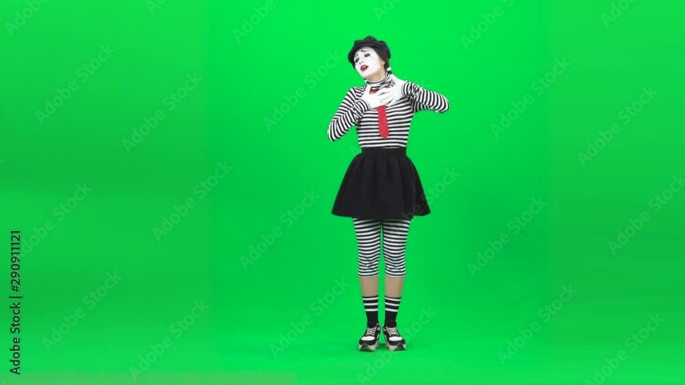 Mime girl singing song and gesticulating. Chroma key. Full length. Mime girl singing song and gesticulating. Chroma key. Full length.