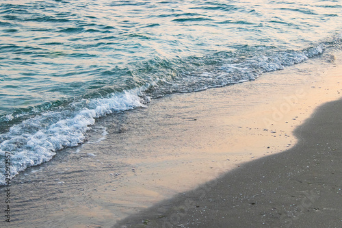 Soft wave of blue sea and sea sand on beach
