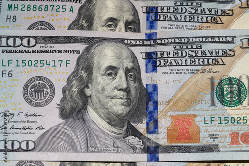 Dollars background, hundred USA dollar banknote bills, many American cash money, finance concept, selective focus.