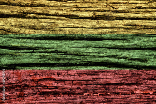 Lithuania flag on an old decrepit wooden surface.