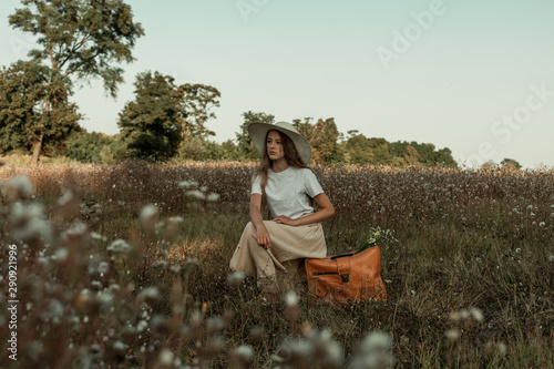 photo session of a girl with a suitcase