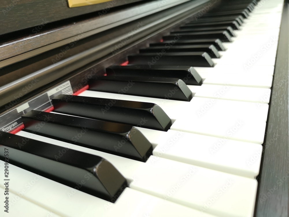 Electric piano keyboard background with selected focus Warm color picture Electric piano keyboard background with selected focus Warm color picture