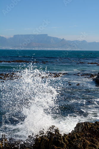 splashing sea in front of table mountain