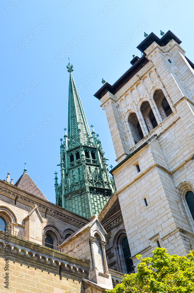 Exterior facade of Saint Pierre Cathedral in Geneva, Switzerland. Built as Roman Catholic cathedral, but became Reformed Protestant Church church during the Reformation. Cathedral spire