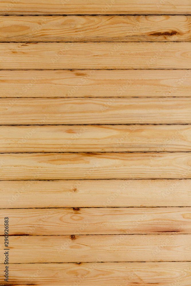 Naklejka premium Natural background - wooden wall made of thin boards
