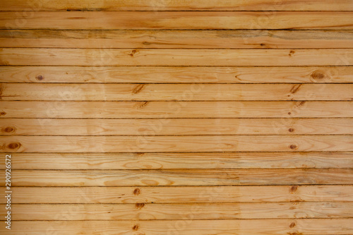 Natural background - wooden wall made of thin boards