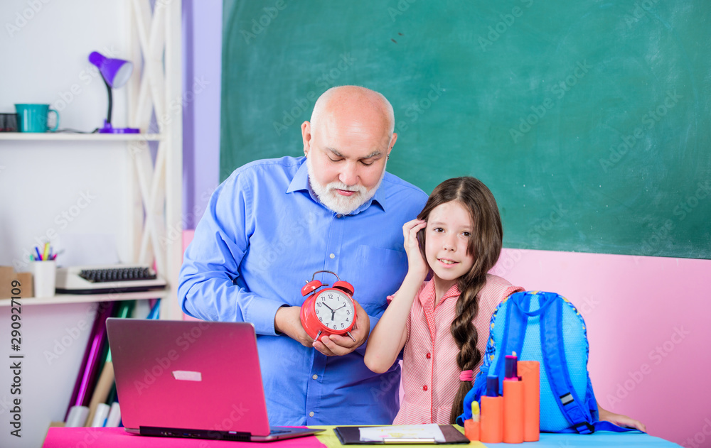 Study online lesson. Pedagogue friendly kind. Punctual pedagogue. Back to school. Teacher help schoolgirl. Study digital science. Little girl man tutor study. Time to study. Beginning of lesson Study online lesson. Pedagogue friendly kind. Punctual pedagogue. Back to school. Teacher help schoolgirl. Study digital science. Little girl man tutor study. Time to study. Beginning of lesson