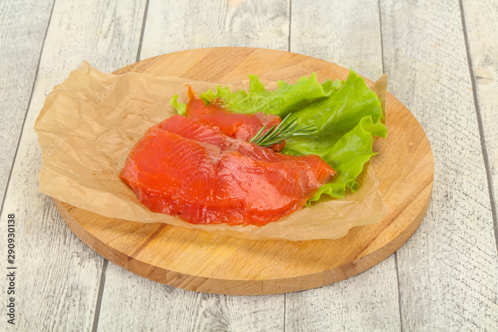 Sliced salmon fillet served rosemary Sliced salmon fillet served rosemary