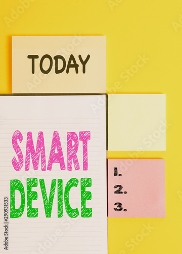 Word writing text Smart Device. Business photo showcasing Electronic gadget that able to connect share interact with user Colored empty papers with copy space on the yellow background table © Artur