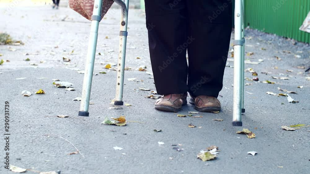 disabled on a Walker is on the road disabled on a Walker is on the road