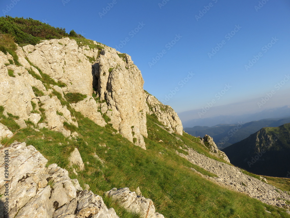 Moutain landscape steem rocky sides