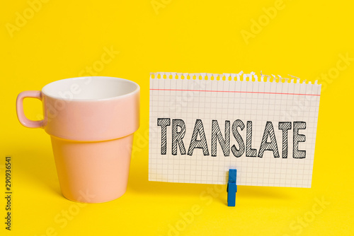Writing note showing Translate. Business concept for Another word with same equivalent meaning of a target language Cup empty paper blue clothespin rectangle shaped reminder yellow office photo