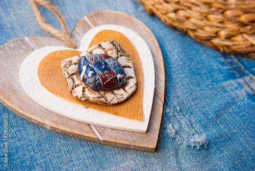Handamde wooden heart in rustic boho style. Romantic valentine card.