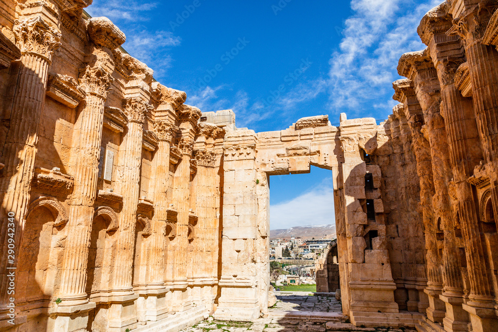 Inner yard of Ancient Roman temple of Bacchus with blue sky in the background, Bekaa Valley, Baalbek, Lebanon