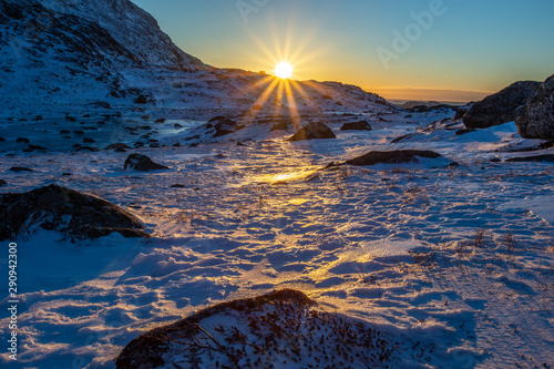 Polar arctic greenlandic sunset over the snow mountains, Nuuk, Greenland