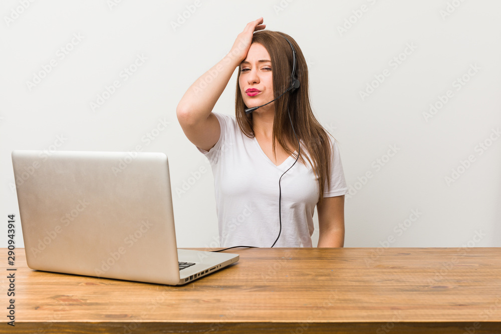 Young telemarketer woman tired and very sleepy keeping hand on head. Young telemarketer woman tired and very sleepy keeping hand on head.