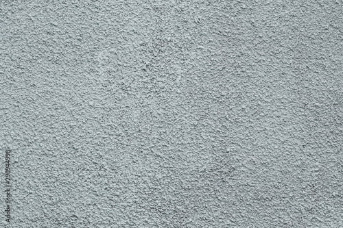 Texture of gray concrete wall. Abstract architecture backdrop. Grunge grey dirty wall texture. Vintage cement background. Plaster of facade. Natural messy structure. Rough stucco surface.