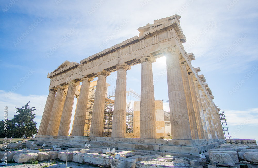 Fototapeta premium A beautiful sunny day at the acropolis hill in Athens Greece , this iconic Parthenon is just amazing , its unbelievable to see such an iconic landmark still standing after more than 2000 years ! 