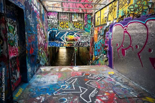 Cool urban graffiti on all parts of underpass © Lance Bellers