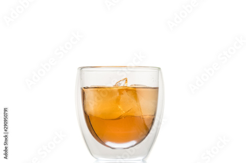 Wallpaper Mural glass of whiskey with ice and a splash and spray from falling on a white background Torontodigital.ca