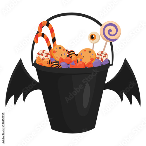 A halloween bucket with bat wings filled with sweets. Cartoon illustration of a basket for Halloween. Vector drawing for children.