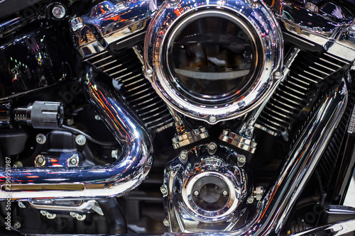 Shiny chrome motorcycle engine with twin piston © themorningglory