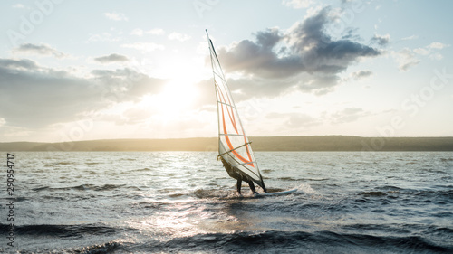Morning windsurfing on the lake sunrise, © Аrtranq
